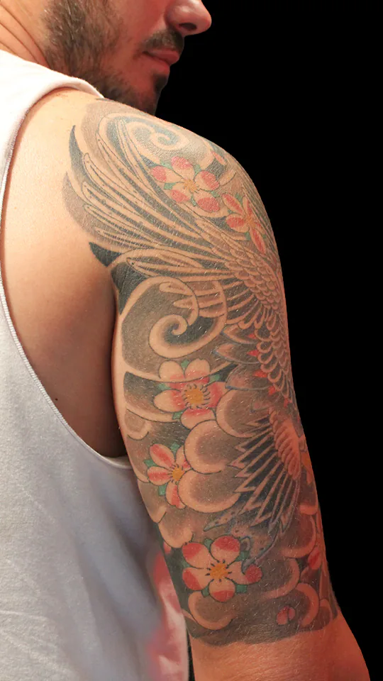 Tatuaje japonés de Grulla (Tsuru) Media Manga vista de Triceps por Nikko Quiroga